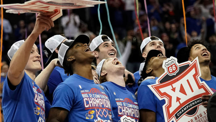 Kansas players celebrate the Big 12 tournament title